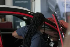 PROTON-SOUTH-AFRICA-WINNER-GETS-INTO-CAR-scaled