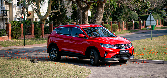 Red PROTON X50: STYLISH AND SAFE SUV